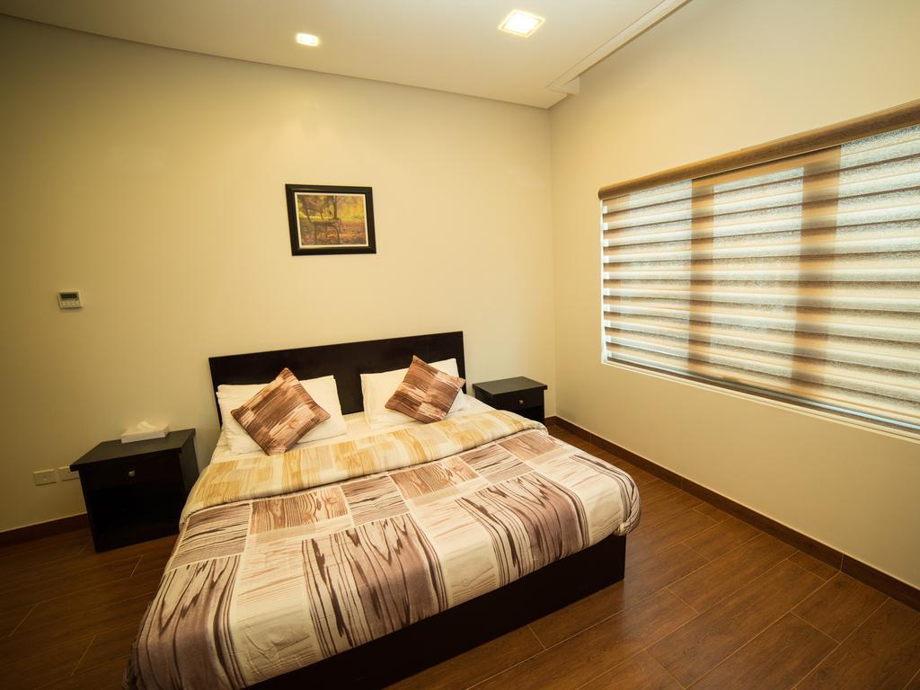 Golden Rose Luxury Suites Manamah Buitenkant foto