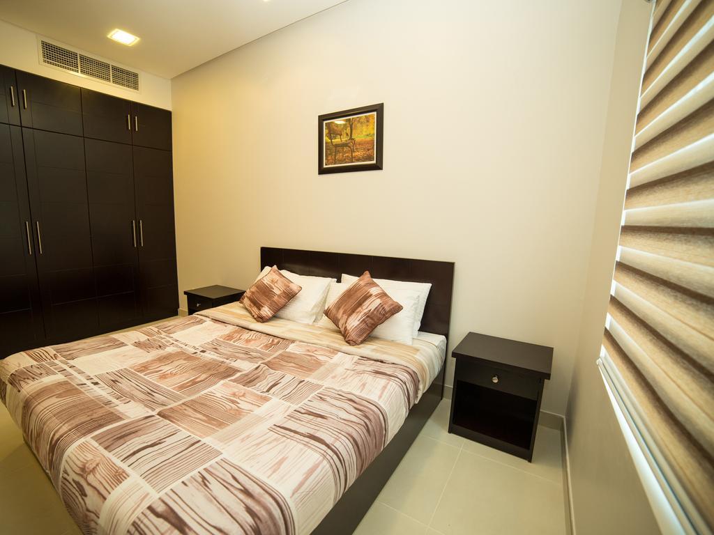 Golden Rose Luxury Suites Manamah Buitenkant foto