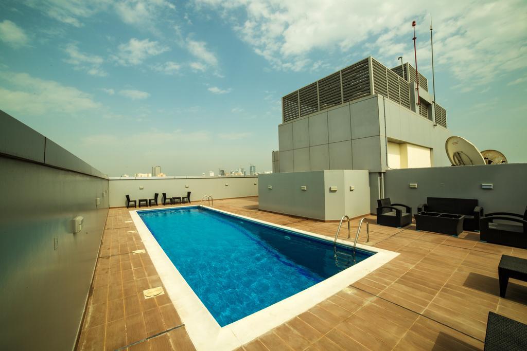 Golden Rose Luxury Suites Manamah Buitenkant foto