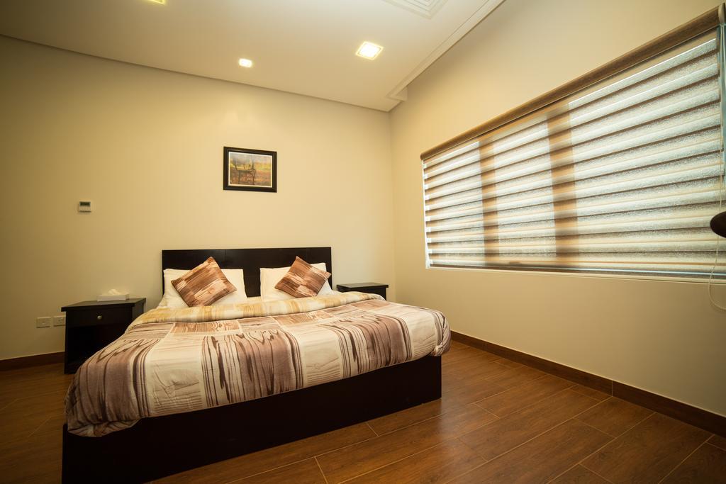 Golden Rose Luxury Suites Manamah Buitenkant foto