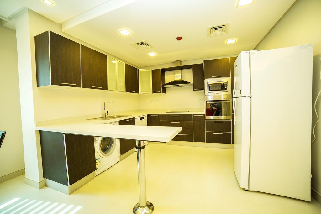 Golden Rose Luxury Suites Manamah Buitenkant foto