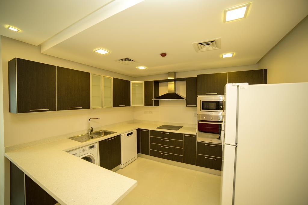 Golden Rose Luxury Suites Manamah Buitenkant foto