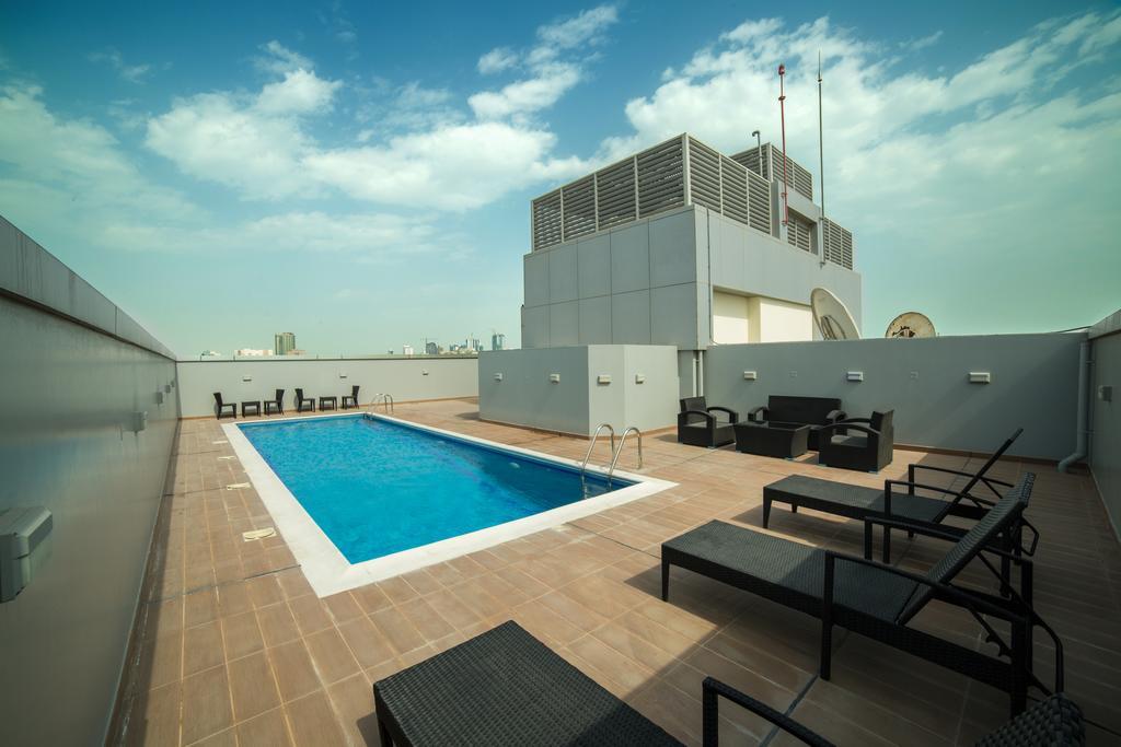 Golden Rose Luxury Suites Manamah Buitenkant foto
