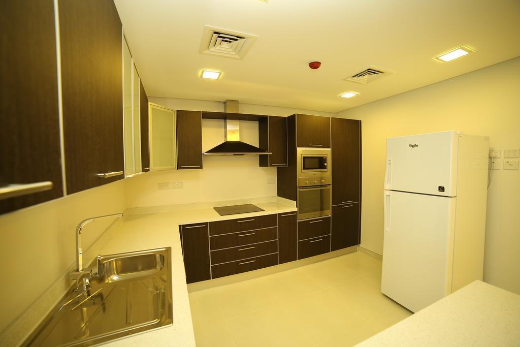 Golden Rose Luxury Suites Manamah Buitenkant foto