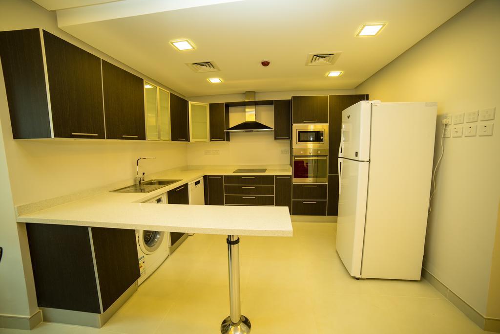 Golden Rose Luxury Suites Manamah Buitenkant foto